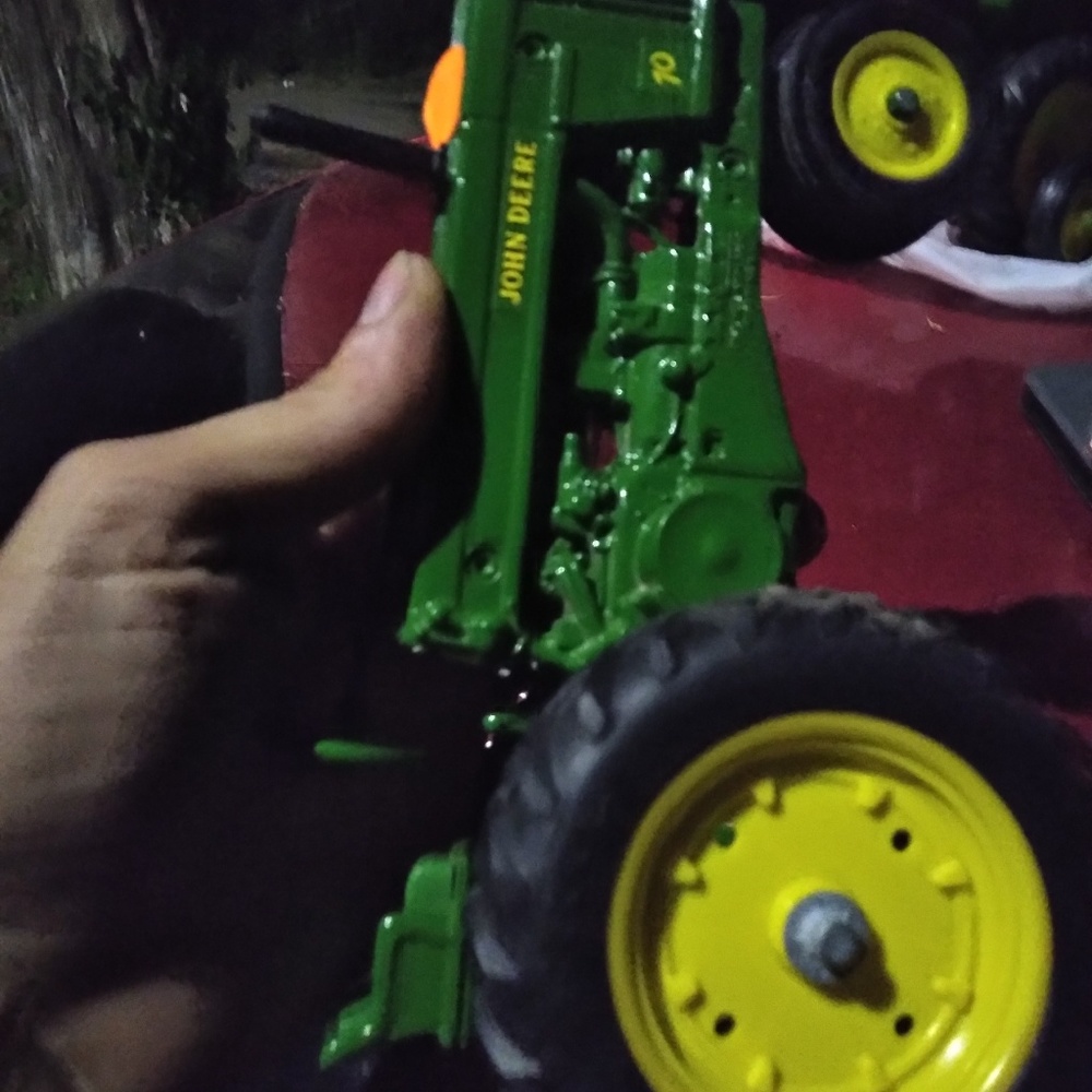 6 different metal John Deere tractor s